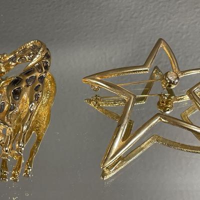 Ultra Craft pin and giraffe pin