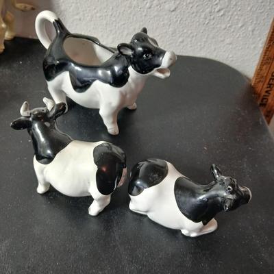 Adorable collection of Holstein cow-themed decorative and household items Otagiri Salt & Pepper, Tomy toy, Resin cow and more
