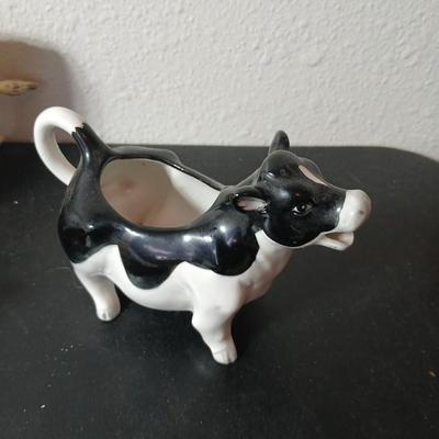 Adorable collection of Holstein cow-themed decorative and household items Otagiri Salt & Pepper, Tomy toy, Resin cow and more