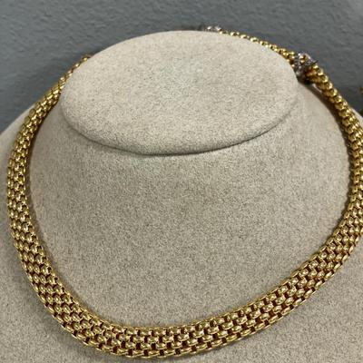 Glowing in gold tone necklaces