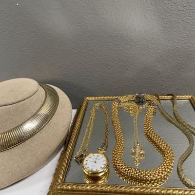 Glowing in gold tone necklaces