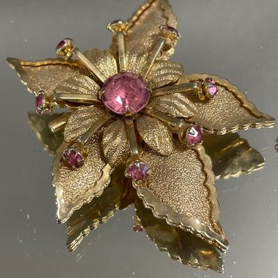 Pink stone gold tone brooch & Sarah C brooch
