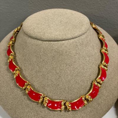 Red enamel, black Avon and brown chicos necklaces