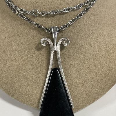 Red enamel, black Avon and brown chicos necklaces