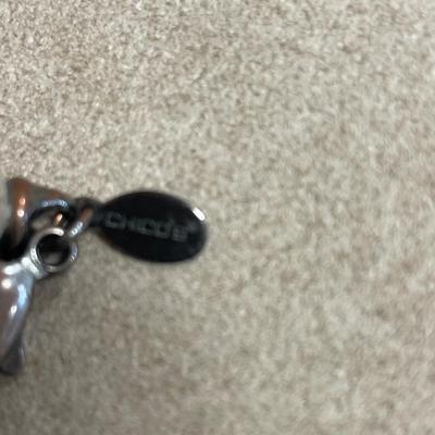 Red enamel, black Avon and brown chicos necklaces