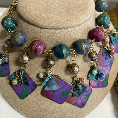 Mauve/burgundy necklaces