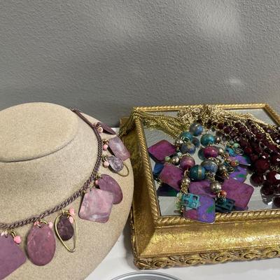 Mauve/burgundy necklaces