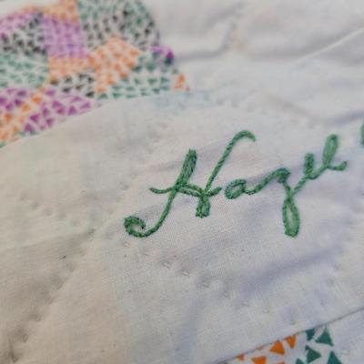 Antique Handmade quilt, likely a "friendship" or "signature" quilt