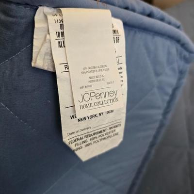 Twin sized bed with Brand new mattress & Boxsprings still in manufactured coverings - complete with quilted bedding