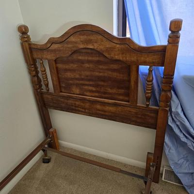 Twin sized bed with Brand new mattress & Boxsprings still in manufactured coverings - complete with quilted bedding