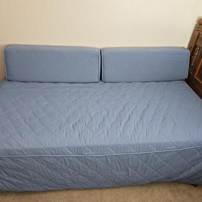 Twin sized bed with Brand new mattress & Boxsprings still in manufactured coverings - complete with quilted bedding
