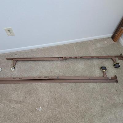 Twin sized bed with Brand new mattress & Boxsprings still in manufactured coverings - complete with quilted bedding