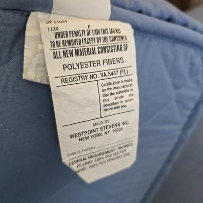 Twin sized bed with Brand new mattress & Boxsprings still in manufactured coverings - complete with quilted bedding