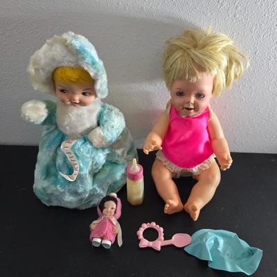 Vintage pajama bag doll with a 1966 Mattel Cheerful Tearful Baby Doll with some accessories