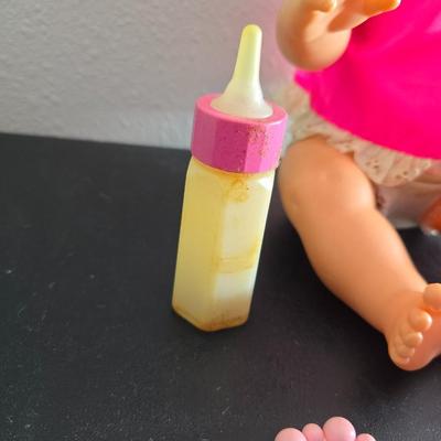 Vintage pajama bag doll with a 1966 Mattel Cheerful Tearful Baby Doll with some accessories