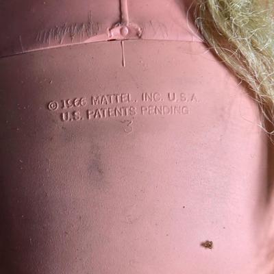 Vintage pajama bag doll with a 1966 Mattel Cheerful Tearful Baby Doll with some accessories