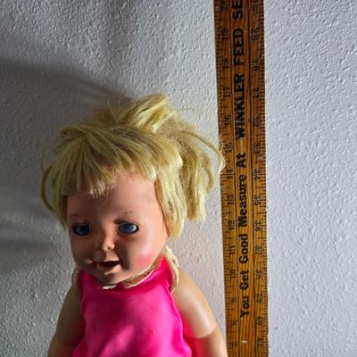 Vintage pajama bag doll with a 1966 Mattel Cheerful Tearful Baby Doll with some accessories