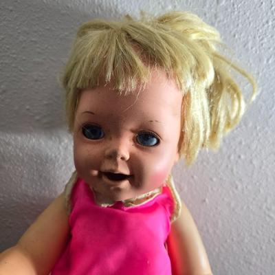 Vintage pajama bag doll with a 1966 Mattel Cheerful Tearful Baby Doll with some accessories