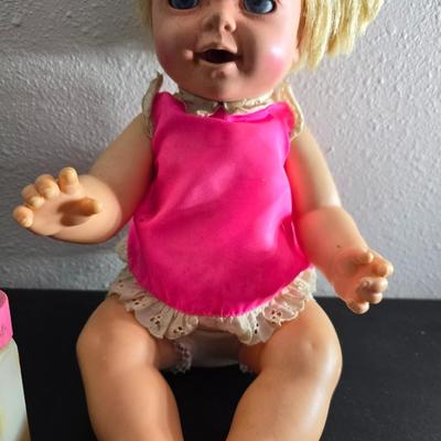 Vintage pajama bag doll with a 1966 Mattel Cheerful Tearful Baby Doll with some accessories