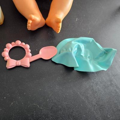 Vintage pajama bag doll with a 1966 Mattel Cheerful Tearful Baby Doll with some accessories