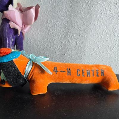 Three vintage felt stuffed dogs - 4-H Center souvenir dog, purple poodle dog, and a "Personality Pet" Dog by the Collegiate...