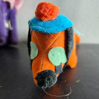 Three vintage felt stuffed dogs - 4-H Center souvenir dog, purple poodle dog, and a "Personality Pet" Dog by the Collegiate...