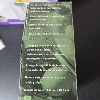 Brand new Rival toaster - New Ultimate 5 piece trivet set - and two new garden themed flour sack towels GREAT GIFT IDEAS!