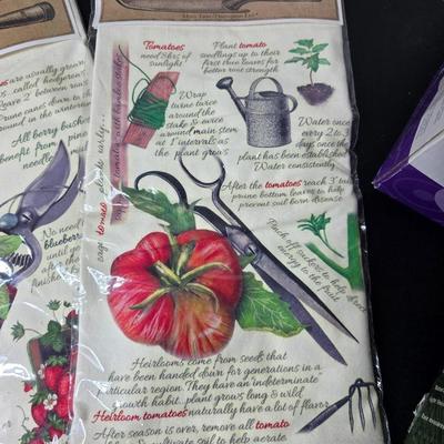 Brand new Rival toaster - New Ultimate 5 piece trivet set - and two new garden themed flour sack towels GREAT GIFT IDEAS!