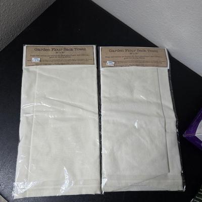 Brand new Rival toaster - New Ultimate 5 piece trivet set - and two new garden themed flour sack towels GREAT GIFT IDEAS!