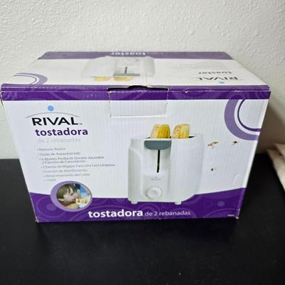 Brand new Rival toaster - New Ultimate 5 piece trivet set - and two new garden themed flour sack towels GREAT GIFT IDEAS!