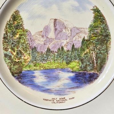 Antique cast iron souvenir bell from the 1915 Panama-California Exposition & a vintage souvenir plate featuring a depiction of Half...