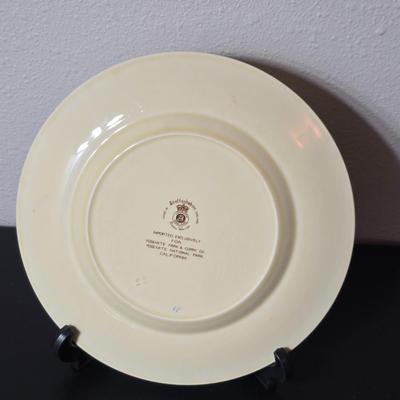 Antique cast iron souvenir bell from the 1915 Panama-California Exposition & a vintage souvenir plate featuring a depiction of Half...