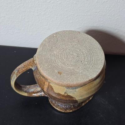 Set of two handmade signed stoneware pottery pieces, a pitcher and a mug