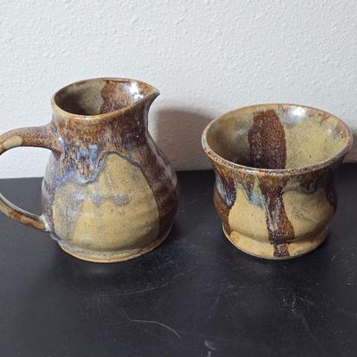 Set of two handmade signed stoneware pottery pieces, a pitcher and a mug