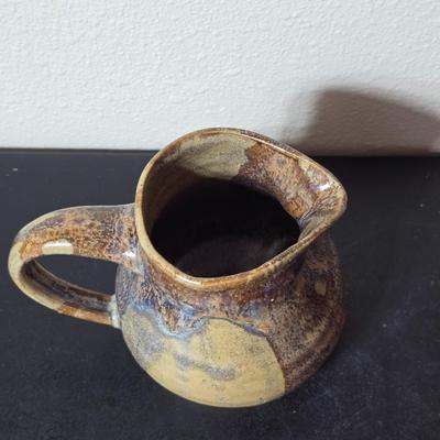 Set of two handmade signed stoneware pottery pieces, a pitcher and a mug