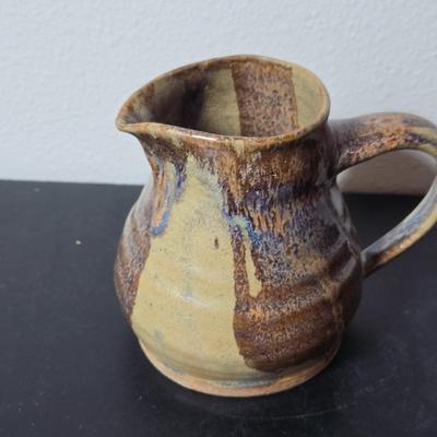 Set of two handmade signed stoneware pottery pieces, a pitcher and a mug