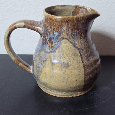 Set of two handmade signed stoneware pottery pieces, a pitcher and a mug