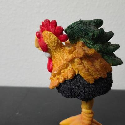 "Cow-Moo-Flage" figurine from the CowParade collection with "Charlie the Rooster" figurine from the Bobble Bods...