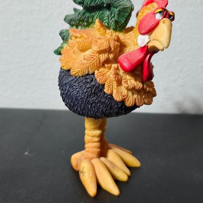 "Cow-Moo-Flage" figurine from the CowParade collection with "Charlie the Rooster" figurine from the Bobble Bods...