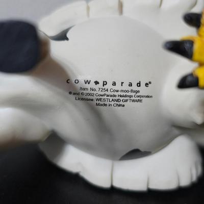 "Cow-Moo-Flage" figurine from the CowParade collection with "Charlie the Rooster" figurine from the Bobble Bods...