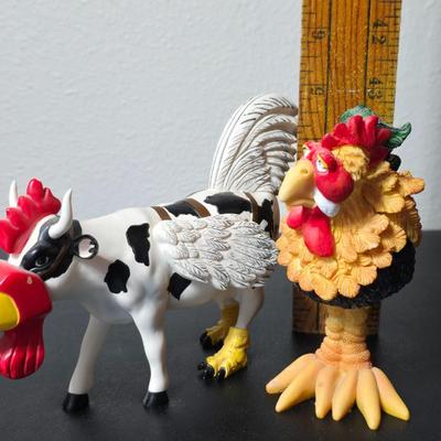 "Cow-Moo-Flage" figurine from the CowParade collection with "Charlie the Rooster" figurine from the Bobble Bods...