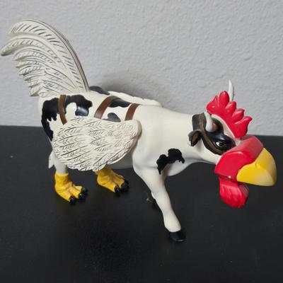 "Cow-Moo-Flage" figurine from the CowParade collection with "Charlie the Rooster" figurine from the Bobble Bods...