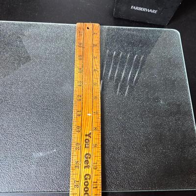 Farberware knife set in Knife block, glass cutting board, Williams Sonoma Vegetable chopper and a Harry & David Contour Pear bamboo...