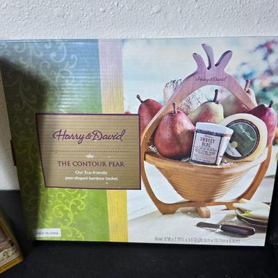 Farberware knife set in Knife block, glass cutting board, Williams Sonoma Vegetable chopper and a Harry & David Contour Pear bamboo...