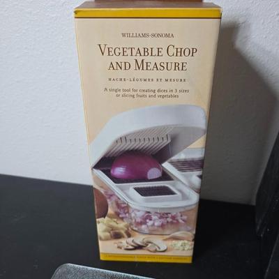 Farberware knife set in Knife block, glass cutting board, Williams Sonoma Vegetable chopper and a Harry & David Contour Pear bamboo...