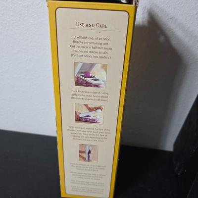 Farberware knife set in Knife block, glass cutting board, Williams Sonoma Vegetable chopper and a Harry & David Contour Pear bamboo...