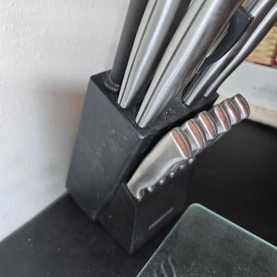 Farberware knife set in Knife block, glass cutting board, Williams Sonoma Vegetable chopper and a Harry & David Contour Pear bamboo...