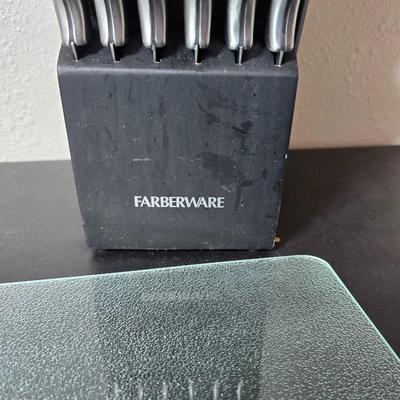 Farberware knife set in Knife block, glass cutting board, Williams Sonoma Vegetable chopper and a Harry & David Contour Pear bamboo...