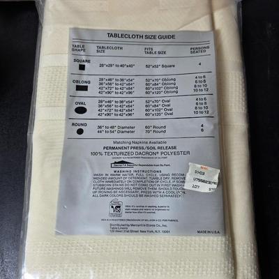 Brand new Corsica 7-piece condiment set - table cloth - and a bread warmer GREAT GIFT IDEAS!