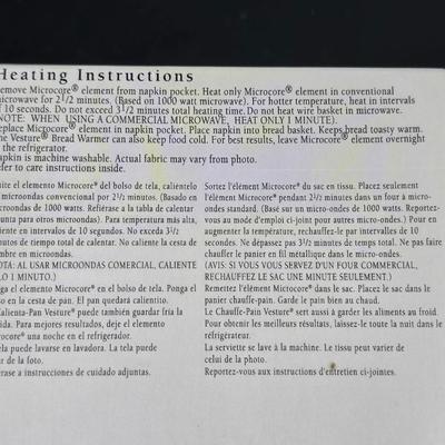 Brand new Corsica 7-piece condiment set - table cloth - and a bread warmer GREAT GIFT IDEAS!